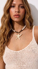 Collar estrella de arena